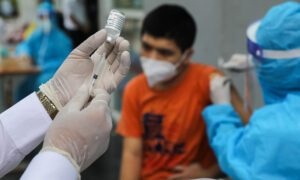 ベトナム 2022年半ばまでに3回目のワクチン接種をすべての成人に